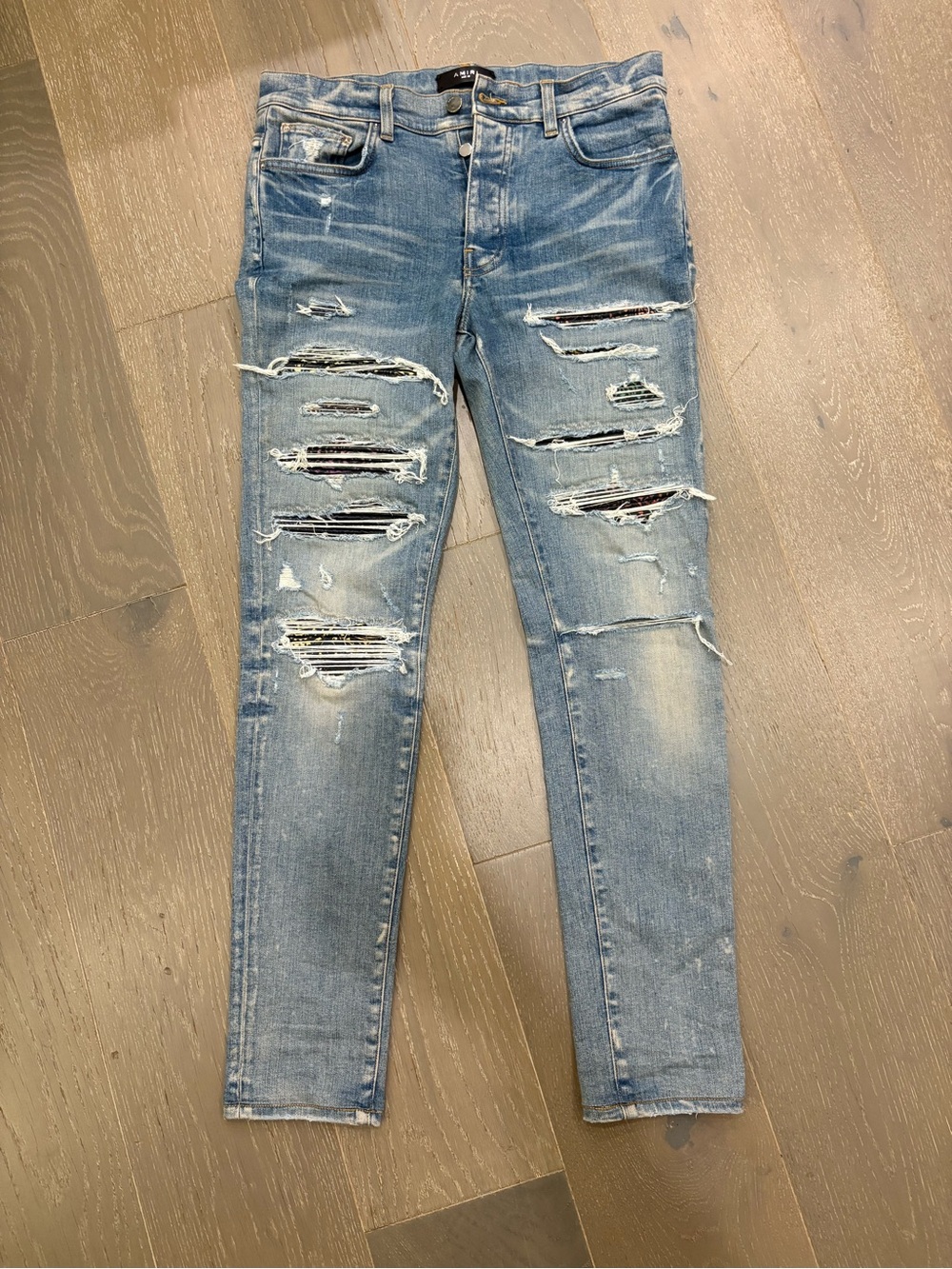 AMIRI Light Blue Distressed Jeans
